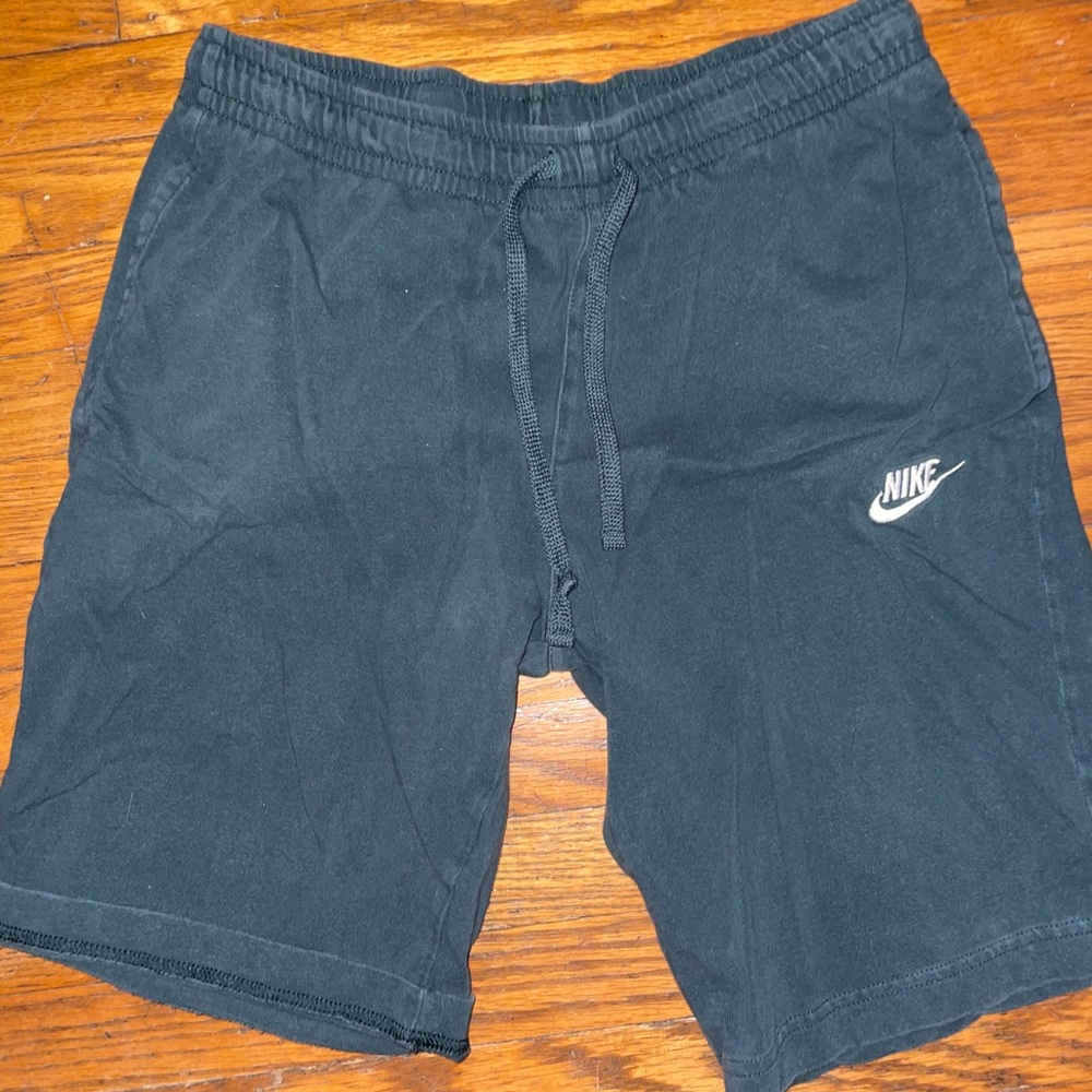 Green Nike shorts